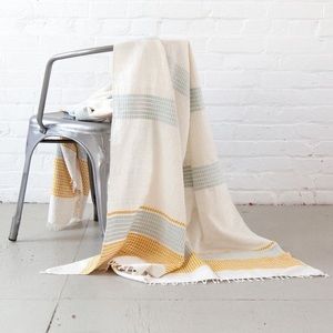 Ethically made throw blanket or picnic blanket
